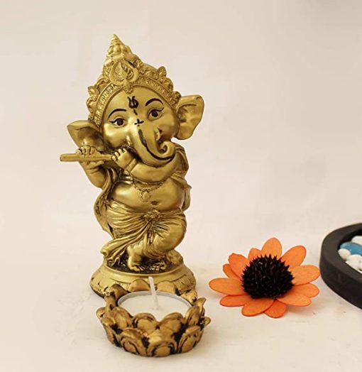 Ganesha Statue Playing Bansuri Flute With Tealight Candle Colorful Stones And Wooden Base Ganesha Statue Playing Bansuri Flute With Tealight Candle Colorful Stones And Wooden Base
