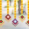 Handmade Artificial Marigold Fluffy Flowers Colorful Woolen Kite Bells Hanging (44 Inches Height) - 1 Piece Wall Decorative Artificial Flower With Bell