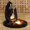Polyresin Black And Golden Handcrafted Palm Lord Buddha Statue With Wooden Base Tealight Candle Holder For Home Decor Home Decorative Buddha Statue With Candle Light