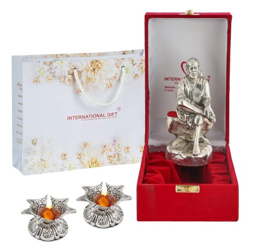Silver Sai Baba Statue with Beautiful Gift Box Packing and with Carry Bag and2 Pieces Diya Set (16 cm X 7 cm X 5.5 cm) Silver Sai Baba Statue with Beautiful Gift Box Packing and with Carry Bag and2 Pieces Diya Set (16 cm X 7 cm X 5.5 cm)