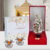 Silver Sai Baba Statue with Beautiful Gift Box Packing and with Carry Bag and2 Pieces Diya Set (16 cm X 7 cm X 5.5 cm) Silver Sai Baba Statue with Beautiful Gift Box Packing and with Carry Bag and2 Pieces Diya Set (16 cm X 7 cm X 5.5 cm)