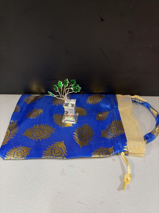 German Silver Tulsi Plant Showpiece / For Car Dashboard /Pooja with attractive multicolor Potli bag German Silver Tulsi Plant Showpiece / For Car Dashboard Pooja