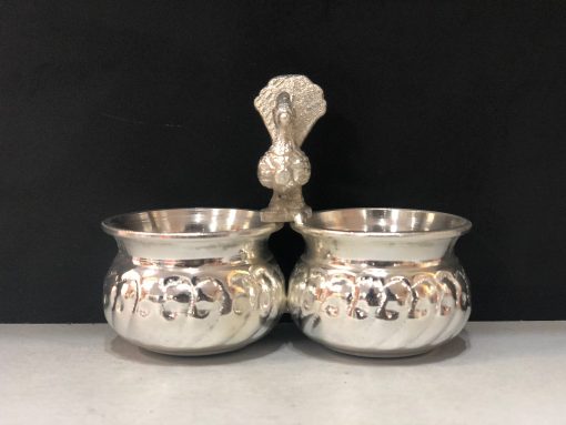 German Silver 2 Bowl Peacock Standing Kumkum Pot For Wedding / Pooja Articles/Return Gift Size : 3 Inches Weight : 140 Grams German Silver 2 Bowl Peacock Standing Kumkum Pot For Wedding / Pooja Articles/Return Gift Size : 3 Inches Weight : 140 Grams