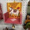 Wood rangoli design stand - yellow and red single piece Wood rangoli design stand - yellow and red single piece
