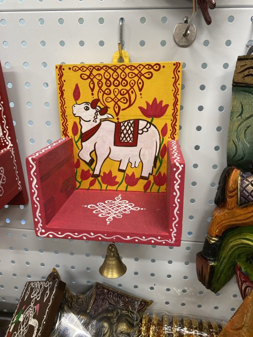 Wood rangoli design stand - yellow and red single piece Wood rangoli design stand - yellow and red single piece
