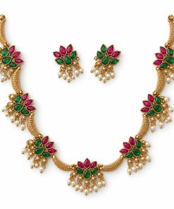 Antique gold ruby and green mango motif choker set with matching earrings on white background