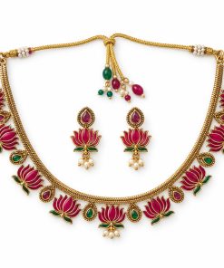 Antique gold ruby and green lotus choker set with matching earrings on white background