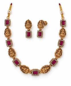 Antique gold ruby Lakshmi temple choker set with matching earrings on white background