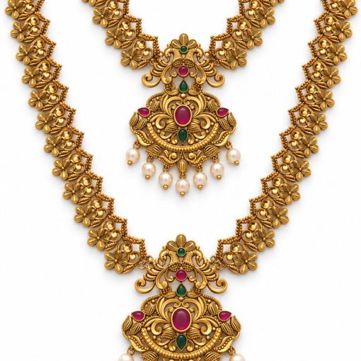 Close-up of floral peacock necklace pendant with pearl drops