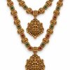 Antique Gold Lakshmi Coin Two-Layer Temple Necklace Set with Jhumka Earrings – 25 cm Close-up of Lakshmi coin temple necklace goddess pendant and jhumka earrings