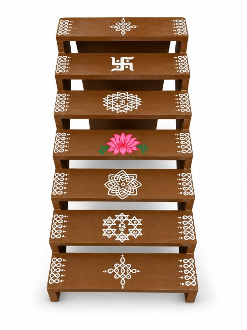 Brown seven-step Golu stand with white kolam and pink lotus designs on a white background