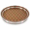 Angled view of 31 cm embossed stainless steel pooja thali showing 3 cm raised rim