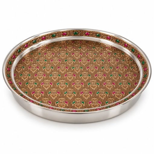 Angled view of 31 cm embossed stainless steel pooja thali showing 3 cm raised rim