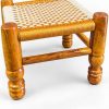 Orange and beige woven wooden Khatli stool professional side view