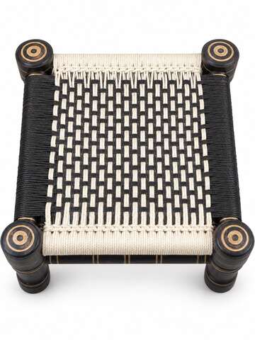 White and black woven wooden Khatli stool professional front view
