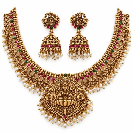 Antique gold Lakshmi pearl fringe short necklace measuring 13 cm with matching jhumka earrings