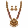 Antique Gold Lakshmi Temple Necklace Set with Jhumka Earrings Antique gold Lakshmi temple necklace set with pink and green stones and matching jhumka earrings