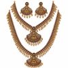 Antique Gold Lakshmi Two-Layer Temple Necklace Set with Earrings – 30 cm & 14 cm Antique gold Lakshmi two-layer necklace set with 30 cm and 14 cm chains and matching earrings