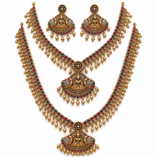 Antique Gold Lakshmi Two-Layer Temple Necklace Set with Earrings – 30 cm & 14 cm Antique gold Lakshmi two-layer necklace set with 30 cm and 14 cm chains and matching earrings