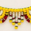 Yellow and Maroon Artificial Flower Door Toran Yellow and maroon artificial flower door toran with white floral strands on a clean ivory background