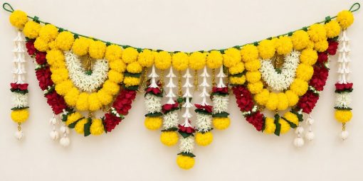 Yellow and maroon artificial flower door toran with white floral strands on a clean ivory background